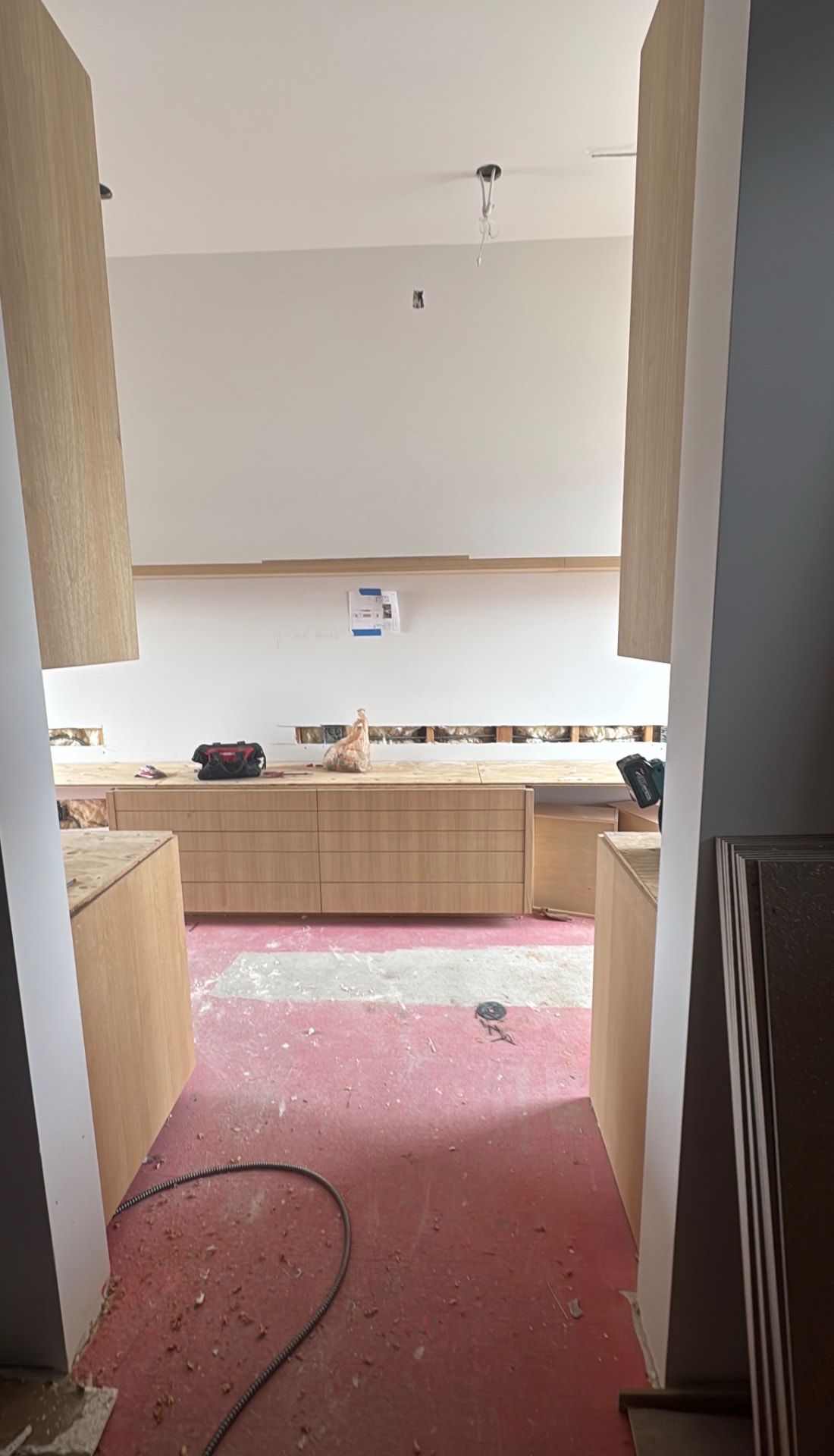 Custom residential built-in cabinetry installation in progress